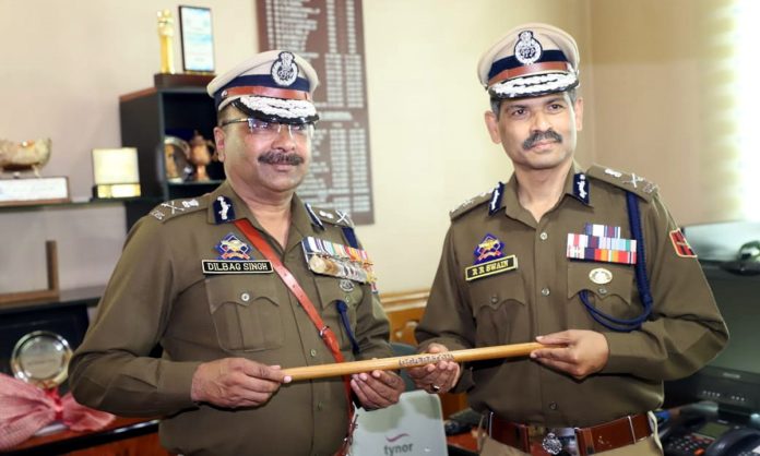 RR Swain taking over as the DGP from Dilbag Singh in Srinagar on Tuesday. RR Swain taking over as the DGP from Dilbag Singh in Srinagar on Tuesday.