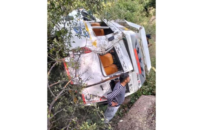 A Tempo Traveller which fell into gorge in Rajouri on Monday. A Tempo Traveller which fell into gorge in Rajouri on Monday.