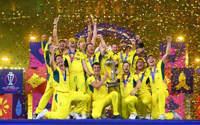 Australian team celebrates victory in cricket World Cup final at Ahmedabad on Sunday.