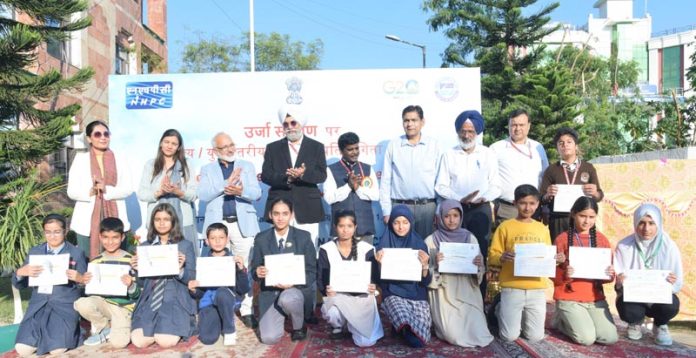 Students posing with certificates.