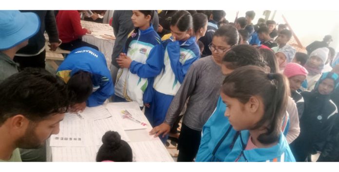 Players completing their registration formalities in Jammu on Wednesday.