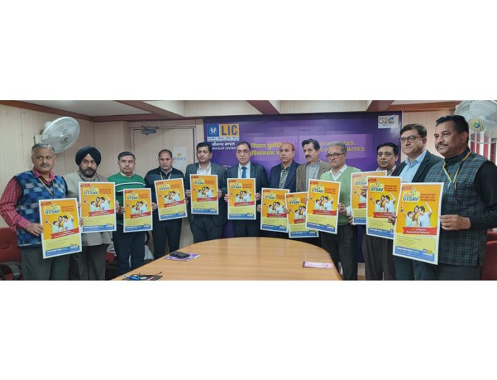 The officials of LIC launching new plan Jeevan Utsav in Jammu on Wednesday.