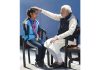 Prime Minister Narendra Modi giving blessings to Jammu and Kashmir Para Archer Sheetal Devi.
