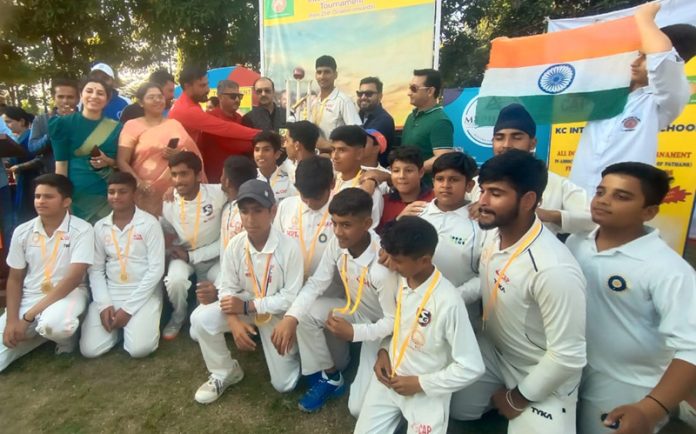 KC International School team posing with trophy. KC International School team posing with trophy.