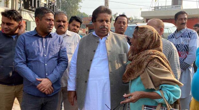 JKPCC Working President Raman Bhalla interacting with people in Jammu on Thursday.