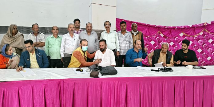 HoD Cardiology GMC & SSH Jammu Dr Sushil Sharma examining patients at Nanak Nagar.