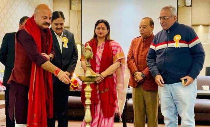BJP leaders lighting the lamp during Trikuta Nagar Development Council function at Jammu on Sunday.