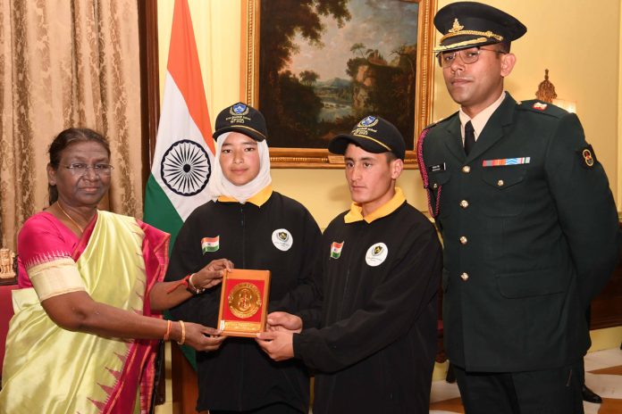 President Droupadi Murmu meeting a group of students from Army Goodwill School, Farona, Kargil attending the National Integration Tour at Rashtrapati Bhavan.