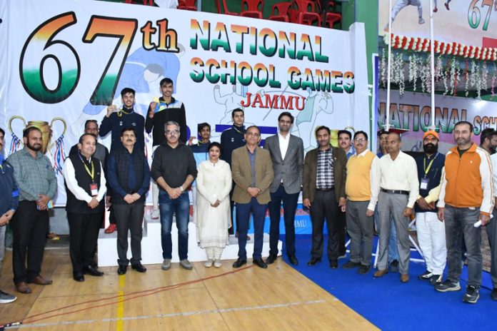 Director Economics and Statistics Ashu Gupta presenting medals to winners at Gymnasium Hall, University of Jammu on Wednesday. Director Economics and Statistics Ashu Gupta presenting medals to winners at Gymnasium Hall, University of Jammu on Wednesday.