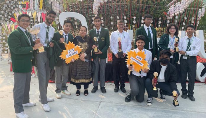 Students of DPS Jammu posing with trophies.