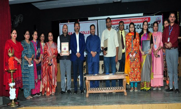 Dogra Group of Colleges management posing with Environmentalist, Ramveer Tanwar in Jammu.