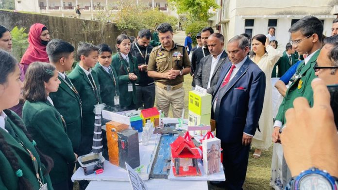 SSP Udhampur, Joginder Singh inspecting models during Literacy Fest at DPS Udhampur.