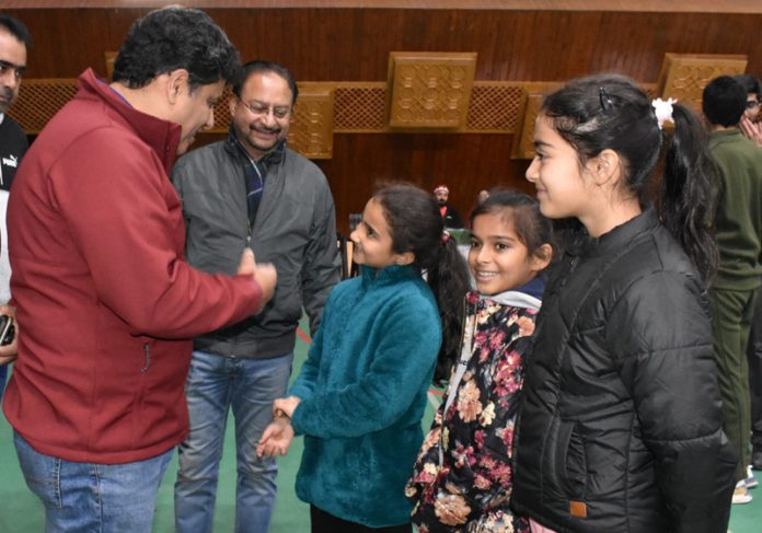 Secretary YSS Sarmad Hafeez interacting with little badminton players at Sher-i-Kashmir Indoor Sports Complex in Srinagar. Secretary YSS Sarmad Hafeez interacting with little badminton players at Sher-i-Kashmir Indoor Sports Complex in Srinagar.
