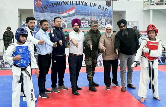 Lieutenant Colonel Gaurav Thapa posing with Taekwondo players and dignitaries at Poonch. Lieutenant Colonel Gaurav Thapa posing with Taekwondo players and dignitaries at Poonch.