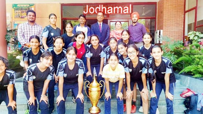 Boys and Girls football team of Jodhamal posing with trophies. Boys and Girls football team of Jodhamal posing with trophies.