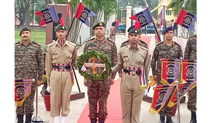 Brig. V K Sharma alongwith NCC cadets paying homage to martyrs at ‘Balidaan Stambh’ in Jammu on Monday.