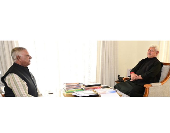 Lt Governor Manoj Sinha meeting with former Minister Sukhnandan Choudhary.