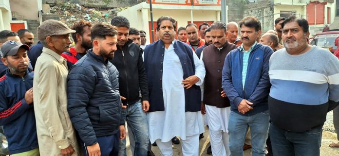 Raman Bhalla meeting with people at Bahu constituency on Saturday.