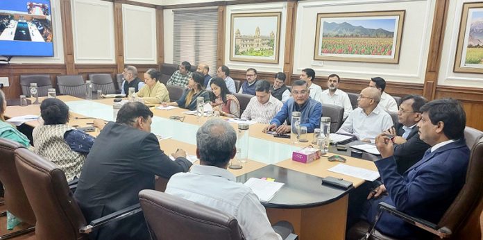 Chief Secretary Dr Arun Kumar Mehta chairing a meeting on Tuesday.