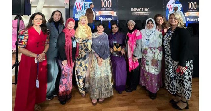 Ritu Singh posing with other women delegates during an event of WEF at London, UK.