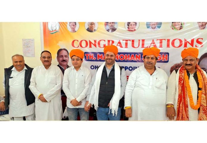 JKPCC chief V R Wani along with other workers during meeting in Jammu.