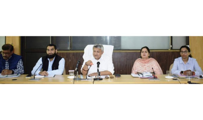 DC Reasi chairing a meeting. DC Reasi chairing a meeting.