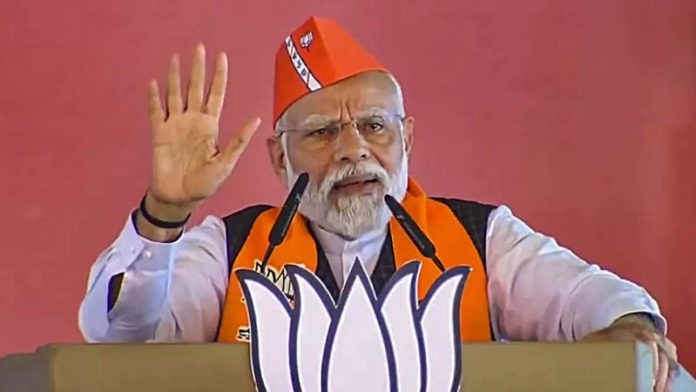 Prime Minister Narendra Modi addresses during a public meeting ahead of Madhya Pradesh Assembly elections, in Sidhi.
