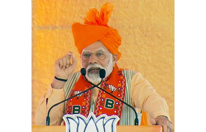 Prime Minister Narendra Modi addrssing a public meeting in Bharatpur on Saturday. (UNI)