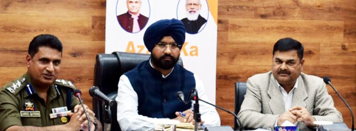 District Magistrate Harvinder Singh with others chairing a meeting at Doda on Sunday.