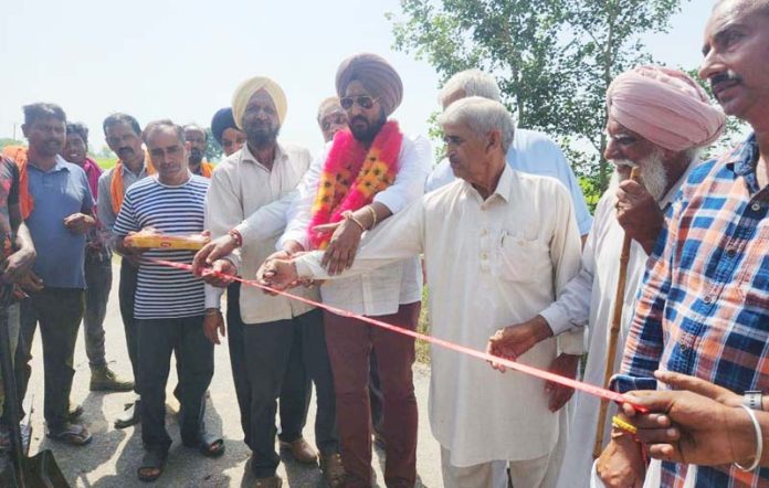 Congress leader, Taranjit Singh Tony inaugurates blacktopping work in Suchetgarh. Congress leader, Taranjit Singh Tony inaugurates blacktopping work in Suchetgarh.