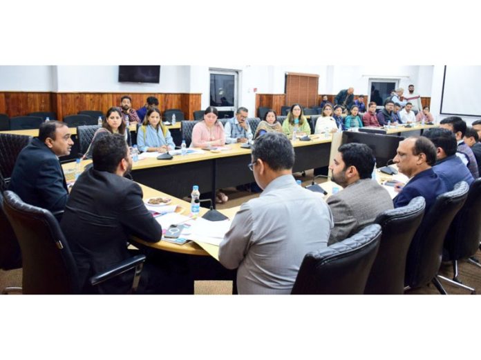 Divisional Commissioner Ramesh Kumar chairing a meeting.