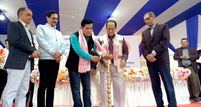 Rajeshwar Singh ‘Raju’ lighting ceremonial lamp at the inaugural of Assam Book Fair.