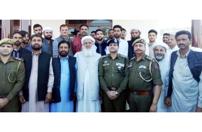 SSP Samba Benam Tosh and his subordinates along with local people at village Dhalout.