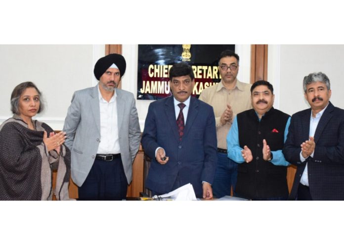 CS Dr Arun K Mehta alongwith others inaugurating online NOCs under the Single Window Portal at Jammu on Wednesday.