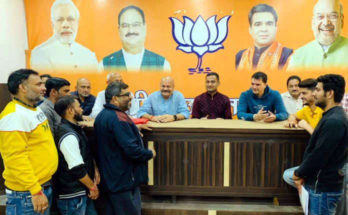 BJP vice president, Yudhvir Sethi listening public grievances at Jammu on Thursday.