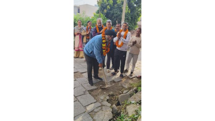 JMC Councillor, Inder Singh Soodan starts drain work in Guru Nanak Nagar on Monday. JMC Councillor, Inder Singh Soodan starts drain work in Guru Nanak Nagar on Monday.