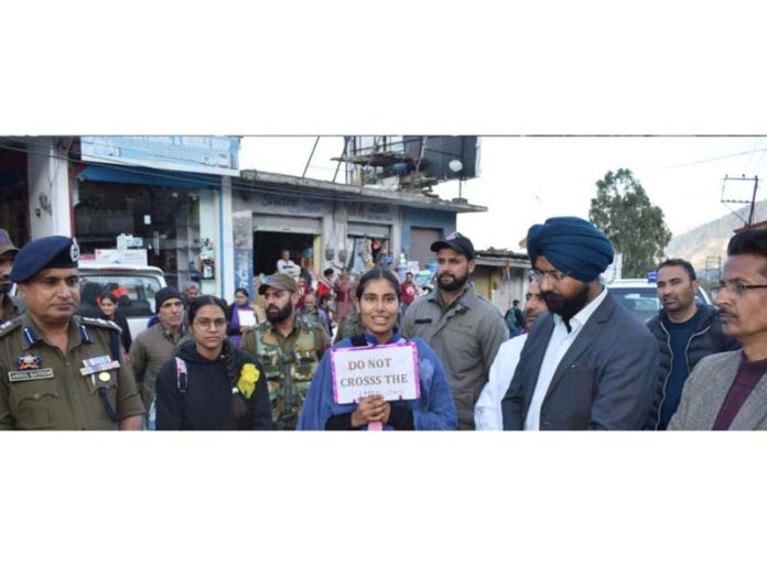 DC Harvinder Singh along with SSP Doda Abdul Qayoom during human chain rally on Wednesday.