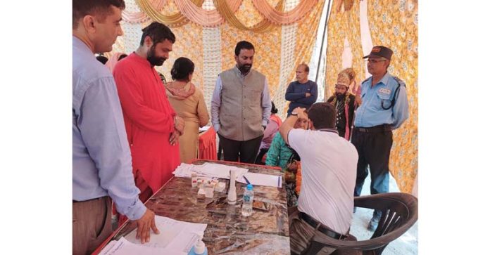 Doctors examining patients during free eye check-up camp by Samvedna Society.
