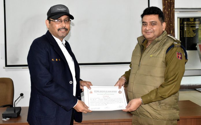 SSP Rajinder Gupta presenting participation certificates during valedictory of training programme at SKPA.