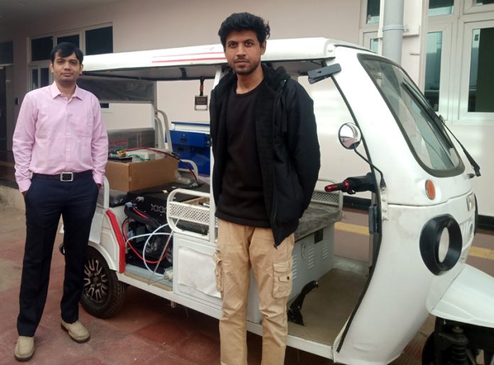 The students of IIT Jammu posing with green hydrogen-fuelled vehicle on Friday.