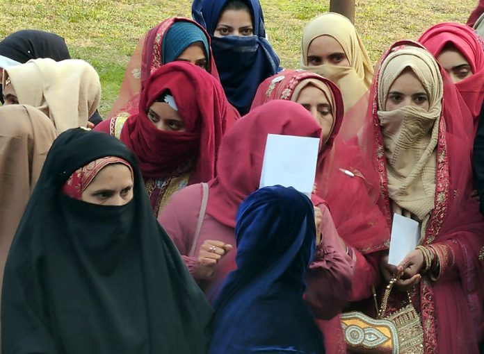 Brides at a mass marriage ceremony held by Jaffaria Council in Srinagar on Friday. -Excelsior/Shakeel