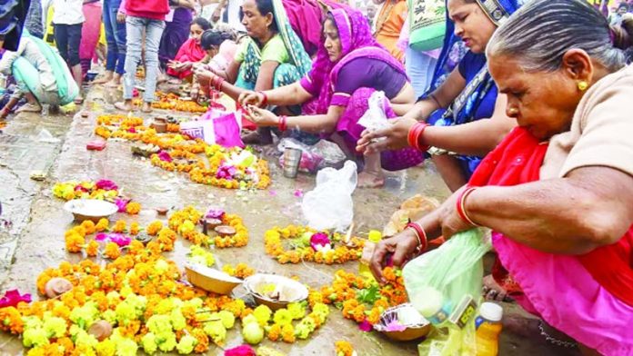 Devotees perform religious rituals after taking a holy dip in the River Yamuna on Kartik Purnima festival, in Prayagraj. Devotees perform religious rituals after taking a holy dip in the River Yamuna on Kartik Purnima festival, in Prayagraj.
