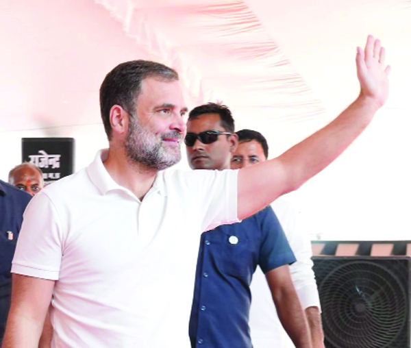 Congress leader Rahul Gandhi waving supporters at an election rally in support of party candidates in Vidisha on Tuesday. (UNI) Congress leader Rahul Gandhi waving supporters at an election rally in support of party candidates in Vidisha on Tuesday. (UNI)