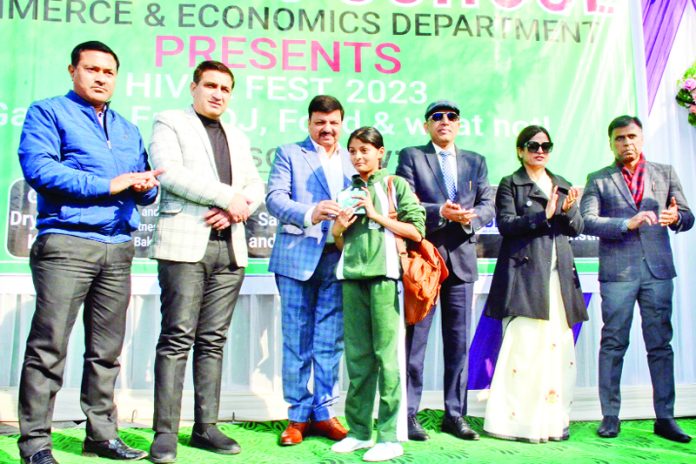 Students being honoured by chief guest Arun Gupta, President Chamber of Commerce and Industry, Jammu during Annual Hiver Fest-2023. Students being honoured by chief guest Arun Gupta, President Chamber of Commerce and Industry, Jammu during Annual Hiver Fest-2023.