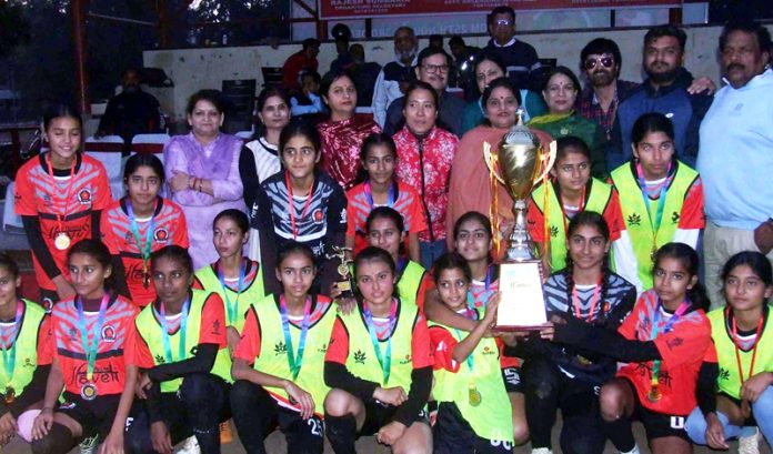 Chief Guest presenting the winner's trophy to Khelo India Centre Hiranagar at Jammu on Sunday.