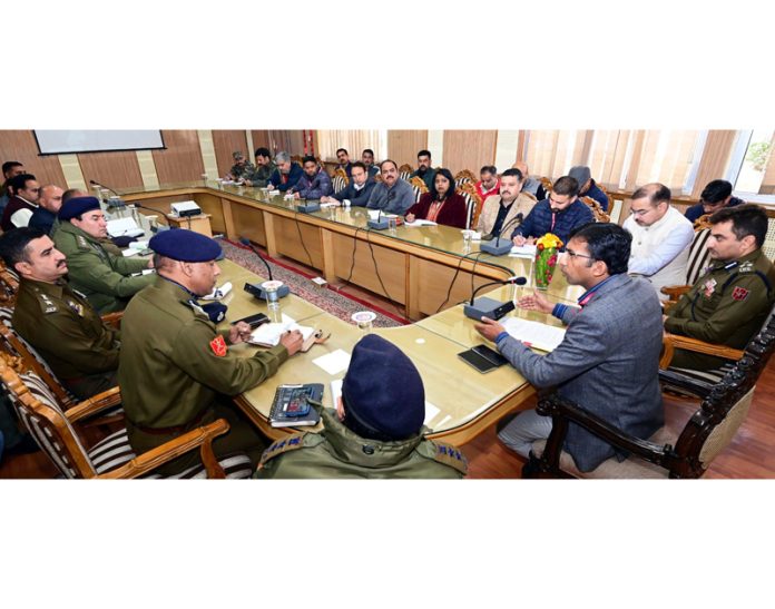 CEO Anshul Garg chairing a meeting.