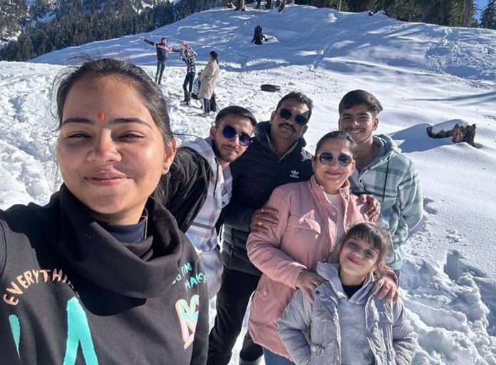 Tourists enjoying snow in famous Padri meadow at Bhaderwah. -Excelsior/Tilak Raj