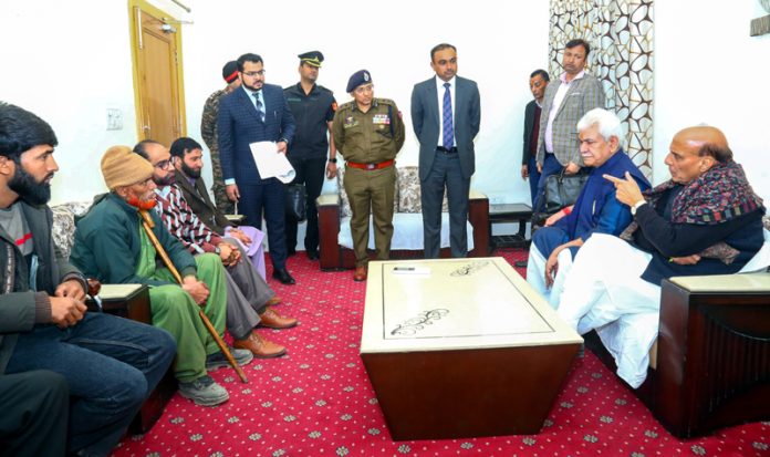 Defence Minister Rajnath Singh interacting with locals in Rajouri on Wednesday. -Excelsior/Imran