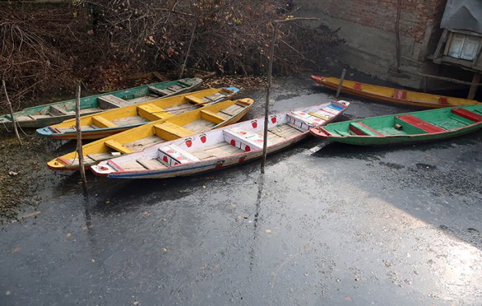 Parts of Dal lake freeze as temperature stood at -5.4oC making it the coldest night so far in Srinagar. -Excelsior/Shakeel