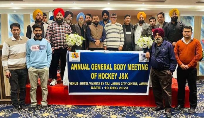 Representatives of Hockey J&K posing during the Annual General Body Meeting at Jammu.